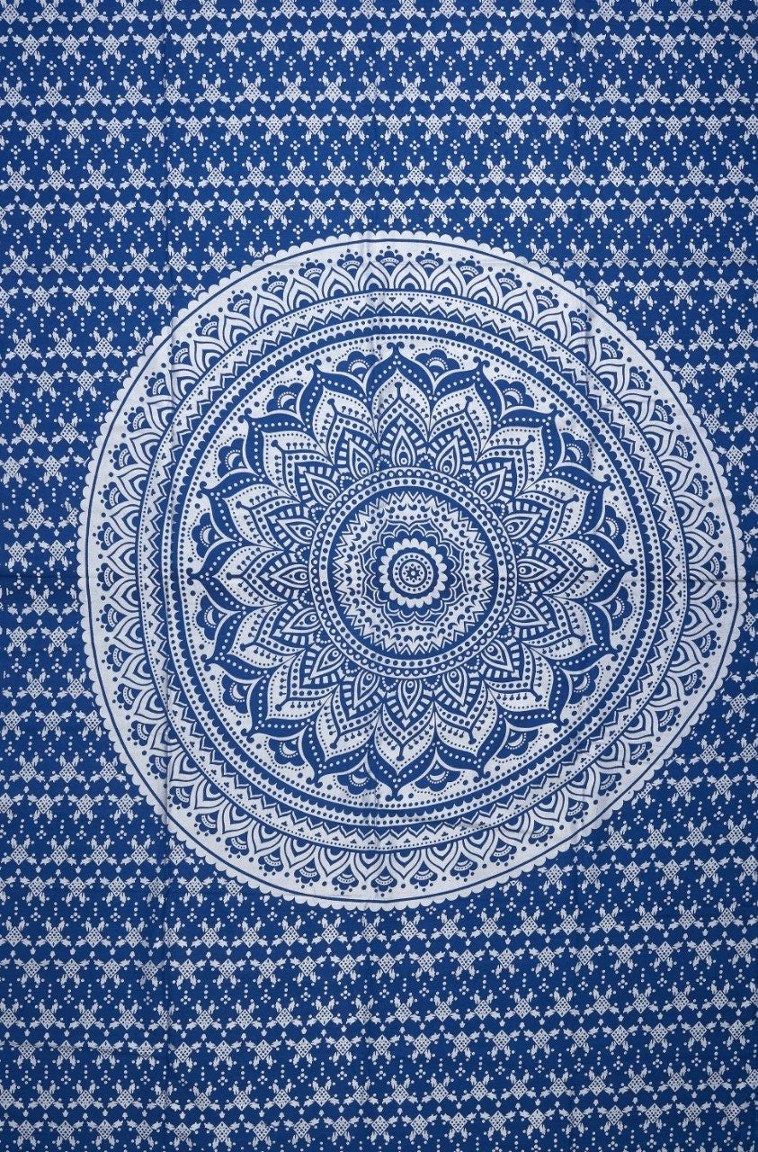 
                  
                    This lovely Indian Mandala tapestry in blue and silver color is a traditional piece of art, handcrafted by the talented local artists of India. A blue and silver Mandala is believed to bring health, wisdom and vitality. You can use the tapestry in a number of ways - as a wall hanging, a bed sheet, yoga/meditation mat, tablecloth, wall art, curtain, beach throw or a picnic blanket. 
                  
                